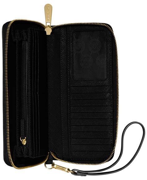 michael michael kors jet set travel quilted leather continental wristlet|mk jet set large wristlet.